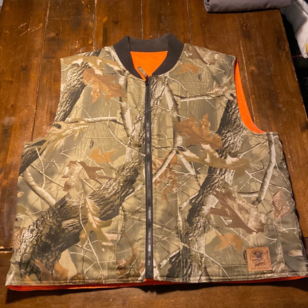 Orange insulated RealTree hunters vest